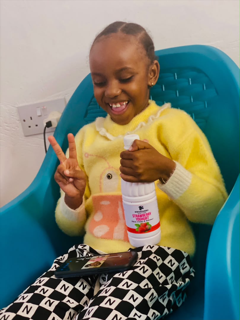 Girl with Strawberry Yoghurt
